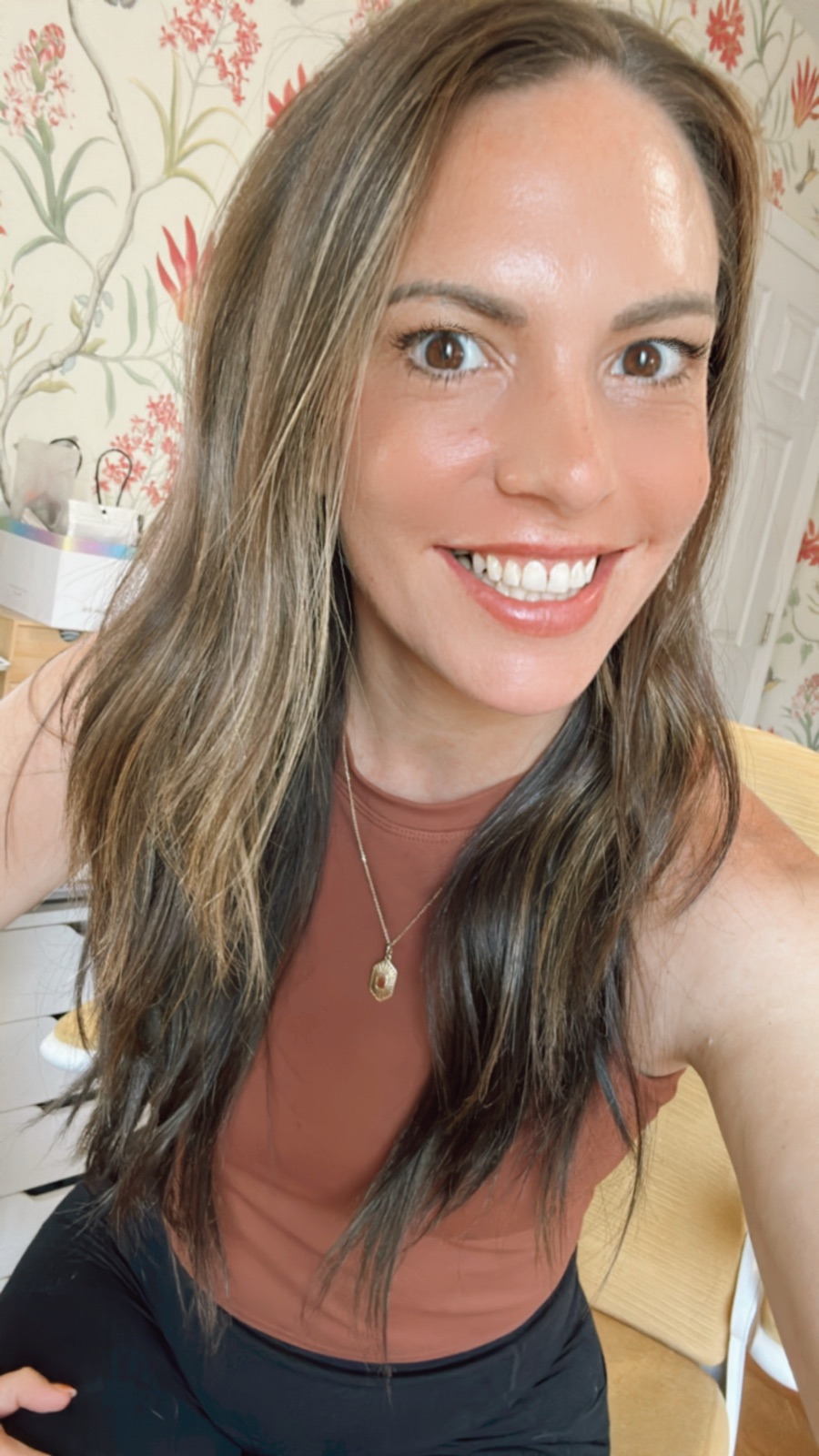 Liz smiling at the camera